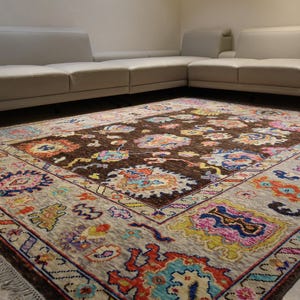 Handknotted Living Room/ Bedroom/ Nursery area rug with vibrant floral motifs and brown field - wool carpet available in multiple sizes