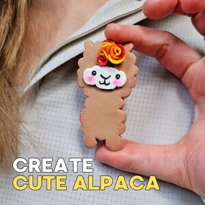 May include: A brown alpaca-shaped craft with a floral headpiece is held in a hand. The alpaca has a white face with pink cheeks and a smiling mouth. The text "CREATE CUTE ALPACA" is at the bottom of the image.
