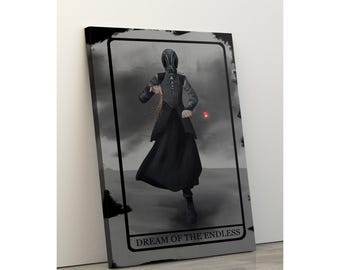 May include: A canvas print depicting a figure in a black outfit and mask, with sand pouring from their hands. The artwork is set against a grey, smoky background, with the text "DREAM OF THE ENDLESS" at the bottom.