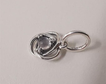 dije colgante circular transparente Pandora con la piedra de nacimiento de abril