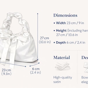 Puede incluir: Bolso de mano de sat&eacute;n blanco con detalle de lazo. El bolso mide 23 cm de ancho, 27 cm de alto (incluida la asa) y 6 cm de profundidad. El bolso tiene un lazo para mayor elegancia.