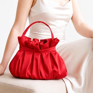 purses for cocktail dresses What Kind of Bags Go with a Dress for a Wedding?
