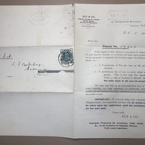 Puede incluir: Una carta antigua doblada, dirigida a L. I. Cortabeys en EE. UU., con un sello y matasellos. El membrete incluye el texto "ELT & CO." y detalles sobre patentes y marcas comerciales.