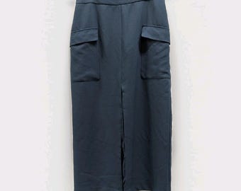 Falda midi cargo Quiet Luxury color verde azulado oscuro estilo academia Officecore minimalista 12