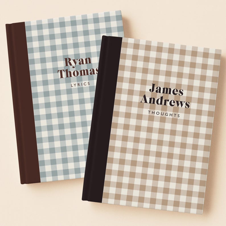 May include: Two hardcover notebooks with a gingham pattern. One is light blue and the other is tan. The light blue notebook has the name "Ryan Thomas" and the word "Lyrics" printed on it. The tan notebook has the name "James Andrews" and the word "Thoughts" printed on it.