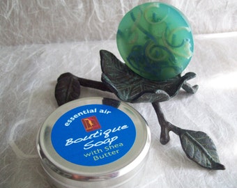 Essential Air Soap handcrafted artisan glycerin soap with natural soap shreds in a metal tin