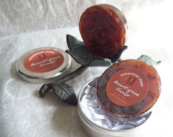 Essential Man Soap handcrafted artisan glycerin soap with Sandalwood soap shreds in a metal tin