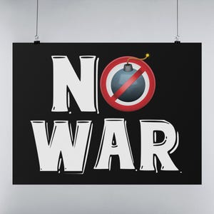 May include: Black poster with the words "NO WAR" in large white block letters. A cartoon bomb with a red prohibition sign is above the word "WAR". The poster is hanging on a white wall.