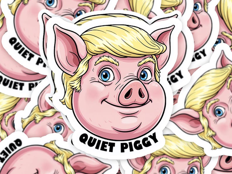 May include: A sticker featuring a cartoon pig with blonde hair and blue eyes. The pig is smiling, and the text "QUIET PIGGY" is printed in black on a white banner below the pig's face. The sticker has a white border.