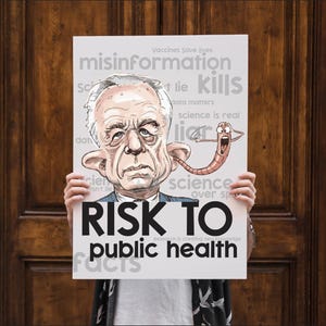 May include: A poster with a cartoon illustration of a man with a worm coming out of his ear. The poster has the words "RISK TO public health" in large black letters. Other text includes "misinformation kills" and "science is real".