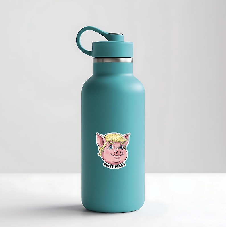 May include: A teal insulated water bottle with a black handle and a silver rim. A sticker of a cartoon pig with blonde hair and the text "QUIET PIGGY" is on the front.