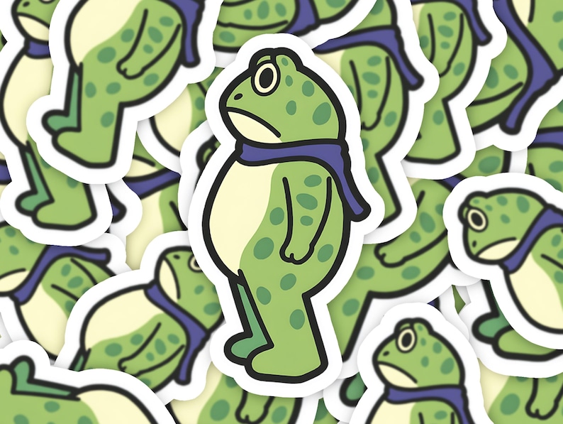 May include: A collection of stickers featuring a cartoon frog with a sad expression. The frog is green with darker green spots, a light yellow belly, and a blue scarf. The stickers have a white border.