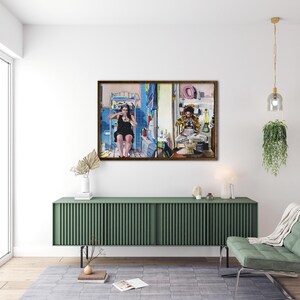 May include: A framed painting depicting two people in separate bathroom settings. The person on the left is a woman with long dark hair, wearing a black dress, sitting on a toilet and holding a phone. The person on the right is a man with a beard, wearing a yellow shirt and a blue hat, sitting on a toilet and holding a phone. The painting is set against a white wall with a green cabinet underneath.