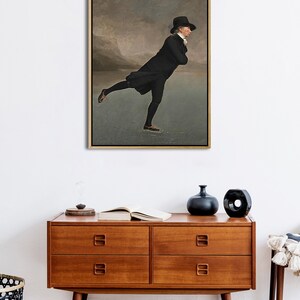 May include: A painting depicting a man ice skating on a frozen lake. He is wearing a black coat, black hat, and black trousers. The background shows a cloudy sky.