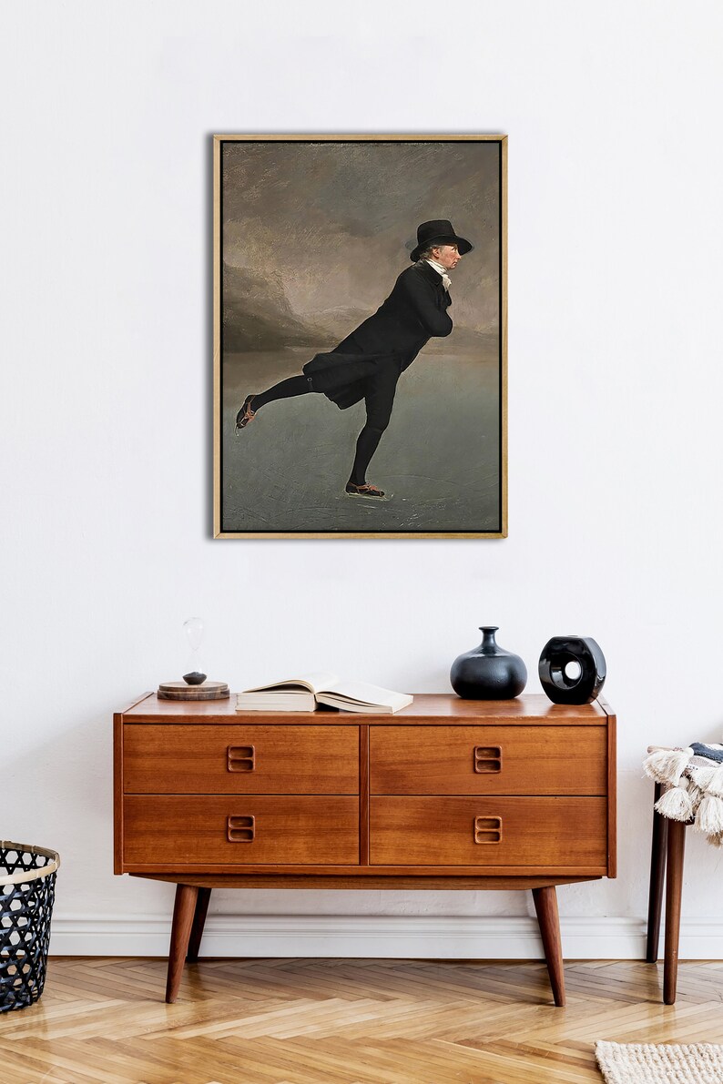 May include: A painting depicting a man ice skating on a frozen lake. He is wearing a black coat, black hat, and black trousers. The background shows a cloudy sky.