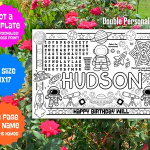 May include: A black and white personalized placemat with an outer space theme. The placemat features the name "HUDSON", an astronaut, planets, rockets, and a maze. Text includes "Happy Birthday Will" and "XL Size 11x17".