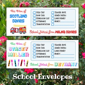 May include: Two rectangular school note envelopes featuring checklists for field trips, book fairs, permission slips, attendance, and money. One envelope displays a fire truck and the text The Mom of Scotland Davies, the other shows colorful crayons and the text The Mom of Stacey Miller.