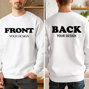 A man wearing a white sweater with the text "FRONT YOUR DESIGN" and "BACK YOUR DESIGN" printed on it.