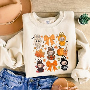 Fall Halloween Labubu Shirt, Spooky Season Shirt, Trick Or Treat Tee, Cute Autumn Pumpkin Labubu T-Shirt, Cozy Skeleton Costume Sweatshirt