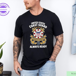 May include: Black t-shirt featuring the text "UNITED STATES COAST GUARD" above a circular emblem with the words "SEMPER PARATUS" and "ALWAYS READY". The emblem has a red, white, and blue design.