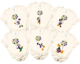 Camiseta Mickey Friends Mardi Gras 2026, camiseta Disney Falls On Tuesday, camiseta Disney Mardi Gras Festival, camiseta WDW Mardi Grass Carnival