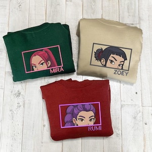 Band Huntrix Embroidered Sweatshirt, Kpop Huntrix Tee, Rumi Zoey Mira Derpy, Demon Hunters Family Shirt, Gift For Fans ESH5205-5207.H