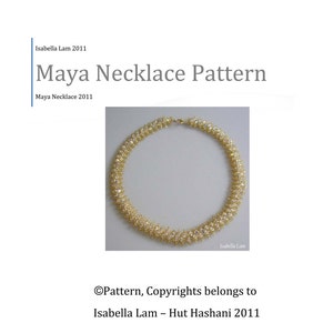 May include: A gold necklace with a delicate design made of small, clear crystals. The necklace is shown on a white background.  "Pattern, Copyrights belongs to Isabella Lam - Hut Hashani 2011"