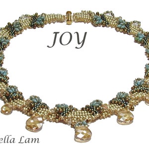 May include: A delicate gold, brown, and blue beaded necklace with crystal drops. The necklace features a woven design and the word "Joy" is written in the center of the image.