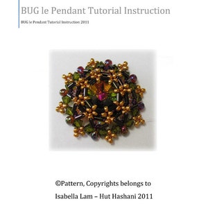 May include: A close-up of a beaded pendant in the shape of a flower. The pendant is made with gold, green, black, and purple beads. The pendant is surrounded by a white background.