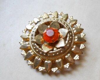 vintage brass flower brooch with topaz rhinestone - costume jewelry