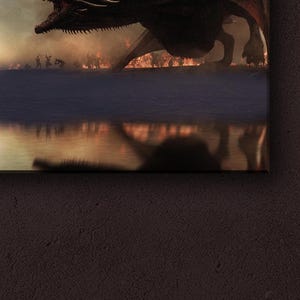May include: A large, black dragon with red eyes and flames coming from its mouth, flying over a battlefield with soldiers and a lake reflecting the scene.