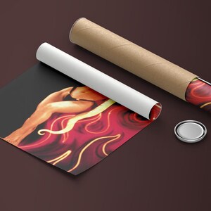 May include: A rolled up poster featuring a woman in a red and yellow abstract design. The poster is rolled up and ready to be shipped.