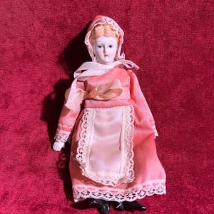 Vintage Porcelain Doll in Pink Dress
