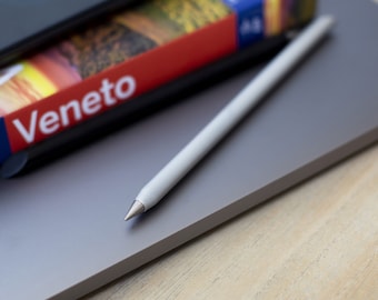 Perpetual design pencil with aluminum body and metal tip. Infinite metal pencil