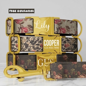 May include: Three pet collars with gold-tone buckles and matching leash. The top collar features a pink floral pattern with the name Lily. The middle collar has a dark floral print with COOPER and 123-456-7890. The bottom collar shows a dark rose print with GUS.