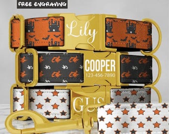 May include: Three pet collars with gold-tone metal buckles and hardware. The top collar is orange with black castle and bat patterns, engraved with Lily. The middle is black with orange witch patterns, engraved with COOPER 123-456-7890. The bottom is white with orange stars, engraved with GUS.