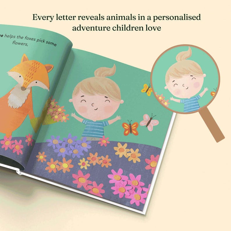 May include: A children's book open to a page featuring a cartoon fox, a child with a blonde ponytail in a blue striped shirt, and colorful flowers. Text reads: Every letter reveals animals in a personalized adventure children love and helps the foxes pick some flowers.