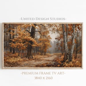 May include: A framed landscape painting of an autumn forest scene. The artwork features a dirt path winding through trees with orange and yellow foliage. The text "-UNITED DESIGN STUDIOS-" and "-PREMIUM FRAME TV ART- 3840 x 2160" are visible.