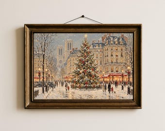 May include: A framed wall art print depicting a snowy Parisian street scene during the holidays. A large, illuminated Christmas tree stands in the center of a plaza, surrounded by people, classic architecture, and the silhouette of Notre Dame.