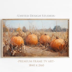 Puede incluir: Pintura enmarcada con cuatro calabazas naranjas en un campo de hierba seca. La obra de arte tiene una paleta de colores cálidos con un cielo azul claro de fondo. El texto "-UNITED DESIGN STUDIOS-" y "-PREMIUM FRAME TV ART- 3840 x 2160" son visibles.