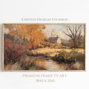 May include: A framed painting of a landscape with a small house in the distance. The painting features a stream running through a field with trees on either side. The colors are muted and earthy, with shades of brown, green, and yellow.