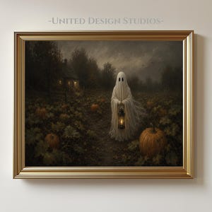 May include: A framed wall art print featuring a ghost draped in a white sheet, holding a lit lantern in a dark pumpkin patch at night. A small house with glowing windows sits in the background. The text UNITED DESIGN STUDIOS appears above.