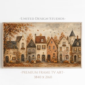 May include: A framed digital artwork titled UNITED DESIGN STUDIOS PREMIUM FRAME TV ART 3840 x 2160 featuring a watercolor-style autumn street scene with European-style houses, orange fall foliage, pumpkins, and flying bats under a cloudy sky.