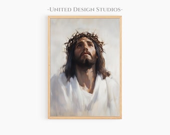 May include: A framed portrait of a man with long dark hair, a beard, and a crown of thorns, looking upwards. The man is wearing a white robe. The text "-UNITED DESIGN STUDIOS-" is at the top of the frame.