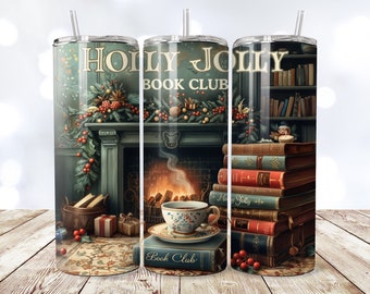 May include: A stainless steel tumbler with a Christmas-themed design featuring a fireplace, books, and the text "Holly Jolly Book Club".