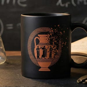 May include: A black ceramic mug with a Greek vase design, an hourglass, a flask, and an open book are arranged on a dark surface. The mug features a detailed orange and black illustration. The background includes mathematical equations.