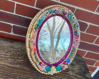 Up cycled vintage mirror, trimmed w pink pearls, beads, gems, odd earrings, recycle art, up cycled mirrorcraft project, beaded mirror