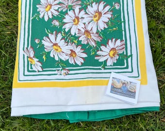 Yellow and white daisy tablecloth with a kelly green boarder: Banquet tablecloth