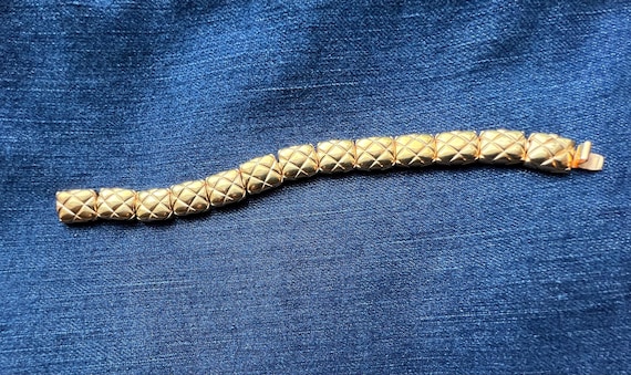 Gold quilted bracelet: 1980's Ciro jewelry