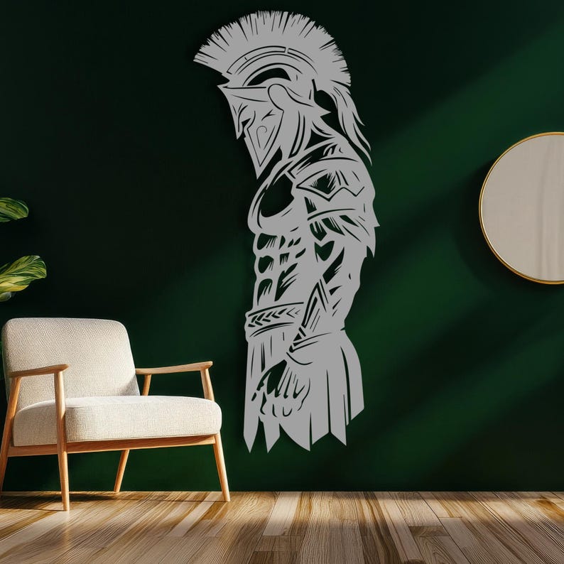May include: A gray metal wall art piece depicting a Spartan warrior in profile. The artwork features intricate details of the warrior's helmet, armor, and physique. The piece is mounted on a dark green wall, with a chair and mirror in the background.